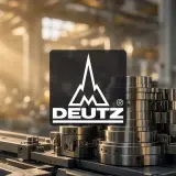 Deutz AG: Präzisionsmetallteile in einer Fabrikhalle, die die Stärke der Deutz Aktie symbolisieren.